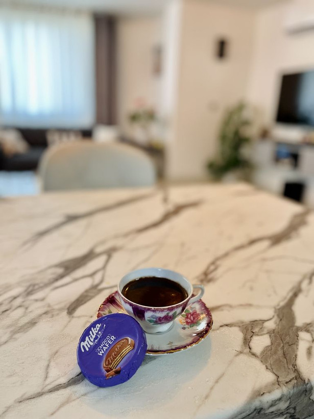 بیسکویت سکه ای با روکش شکلاتی میلکا - 30 گرم